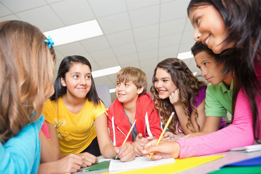 students participating in icebreaker during first day of school